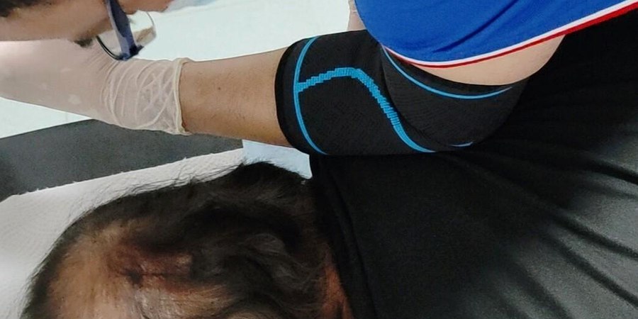Neck and spine adjustment at SIFU TIT TAR Singapore